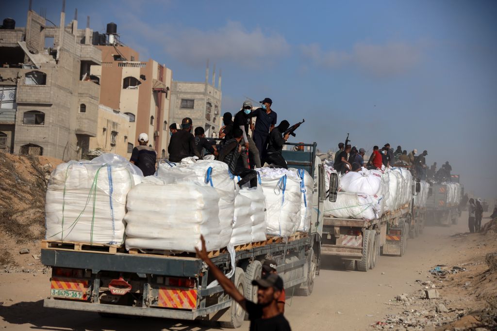 20 Dead in Gaza Aid Stampede Sparked by Armed Hamas Agitators