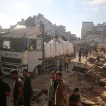 Gazans Seen Cheering Israeli Troops Overseeing Aid Delivery