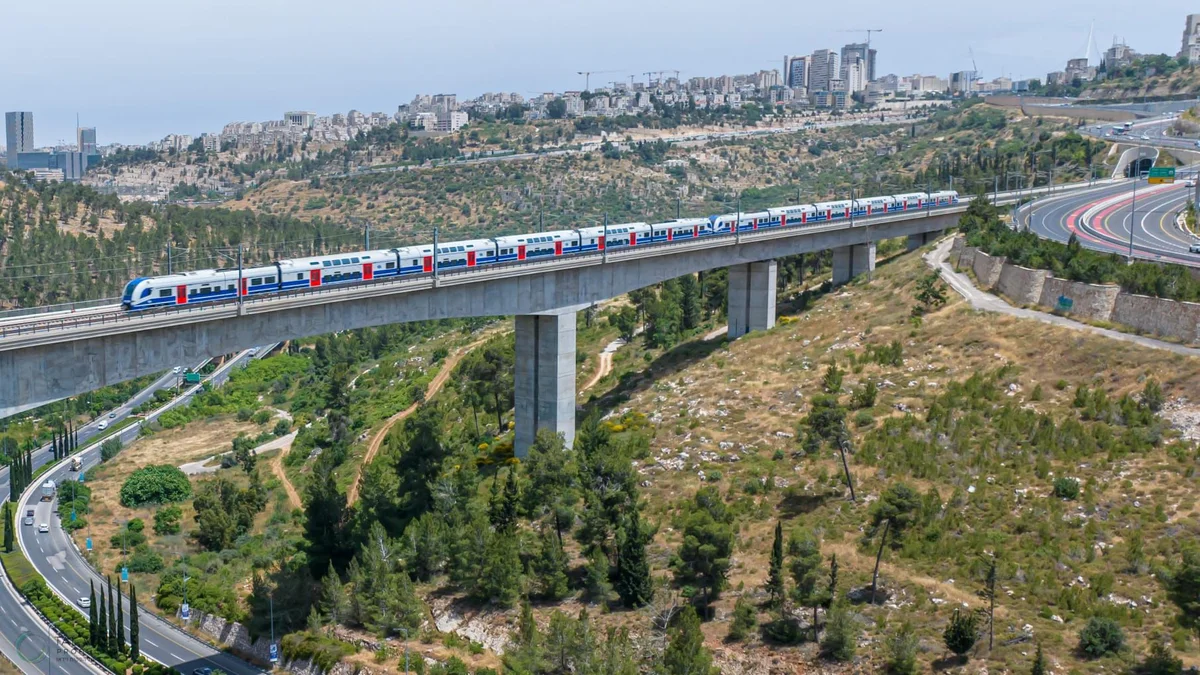 Революция в израильских железных дорогах начинается Israel Railways Service Revolution Begins Israel Railways is set to launch a significant service revolution, introducing a new era of passenger transport with the unveiling of its advanced new train fleet. The initiative, aimed at enhancing travel experience and efficiency, marks a pivotal moment for public transportation in the country. The new fleet boasts state-of-the-art technology, designed to provide passengers with unparalleled comfort and speed. Key features include enhanced seating, improved accessibility for passengers with disabilities, and advanced onboard amenities. The introduction of these modern trains is expected to significantly reduce travel times between major cities and improve overall connectivity. This ambitious project is part of Israel Railways’ broader strategy to modernize its infrastructure and expand its network. The company has invested heavily in research and development to ensure the new trains meet the highest international standards for safety and environmental sustainability. The service revolution is not limited to the new fleet. Israel Railways is also implementing a comprehensive upgrade of its stations, introducing digital information systems, improved waiting areas, and enhanced retail and dining options. These improvements are designed to create a seamless and enjoyable travel experience from start to finish. The launch is scheduled to coincide with the upcoming holiday season, anticipating a surge in passenger numbers. Israel Railways has expressed its commitment to ensuring a smooth transition and providing exceptional service to all travelers. The company is also working closely with the Ministry of Transport to coordinate the rollout and maximize the benefits of this transformative initiative. This revolution in passenger transport is poised to redefine rail travel in Israel, setting a new benchmark for public transportation systems in the region.