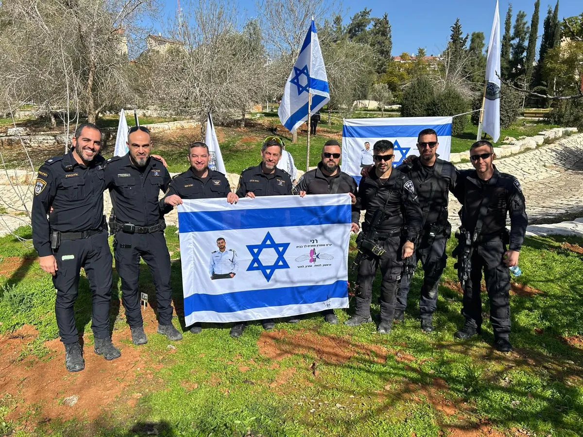 Tu B’Shvat planting honors hero cop Ran Guili