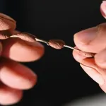 15,000-Year-Old Clay Beads Reveal Earliest Human Jewelry