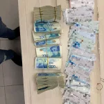 Police seize NIS 17M, arrest disqualified driver