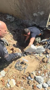 Weapons Parts Fall in Center; Police Respond