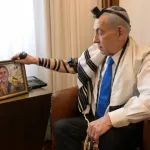 On Memorial Day for the Fallen Soldiers of the Wars of Israel, as in previous years, I am laying tefillin in memory of one of our heroes who fell for our revival and freedom. This year too, I met with the Rebbe’s emissary,