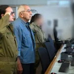 The siren of remembrance was activated by a second-generation Holocaust survivor and his granddaughter, an IDF officer.