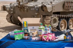 More than 6,200 holiday packages and tens of thousands of food products were distributed to male and female combat soldiers across all sectors.