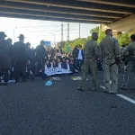 Illegal demonstration on Highway 1 - Rioters are blocking the highway westbound and eastbound and are confronting police officers.