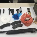 In an operation by Northern District police officers and Border Police fighters yesterday in the city of Arraba, forces raided a compound where they located a cache of weapons that included two Glock pistols,
