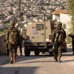 Scan of approximately 100 structures and arrest of two terrorists who advanced terror plots.