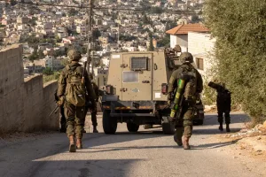 Scan of approximately 100 structures and arrest of two terrorists who advanced terror plots.